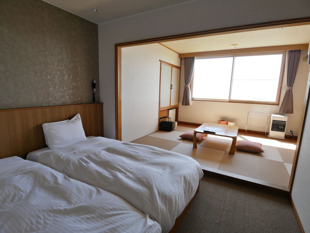 知床夕陽のあたる家 ONSEN HOSTEL 女満別