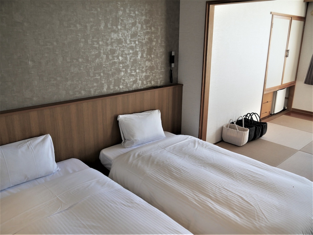 知床夕陽のあたる家 ONSEN HOSTEL 女満別