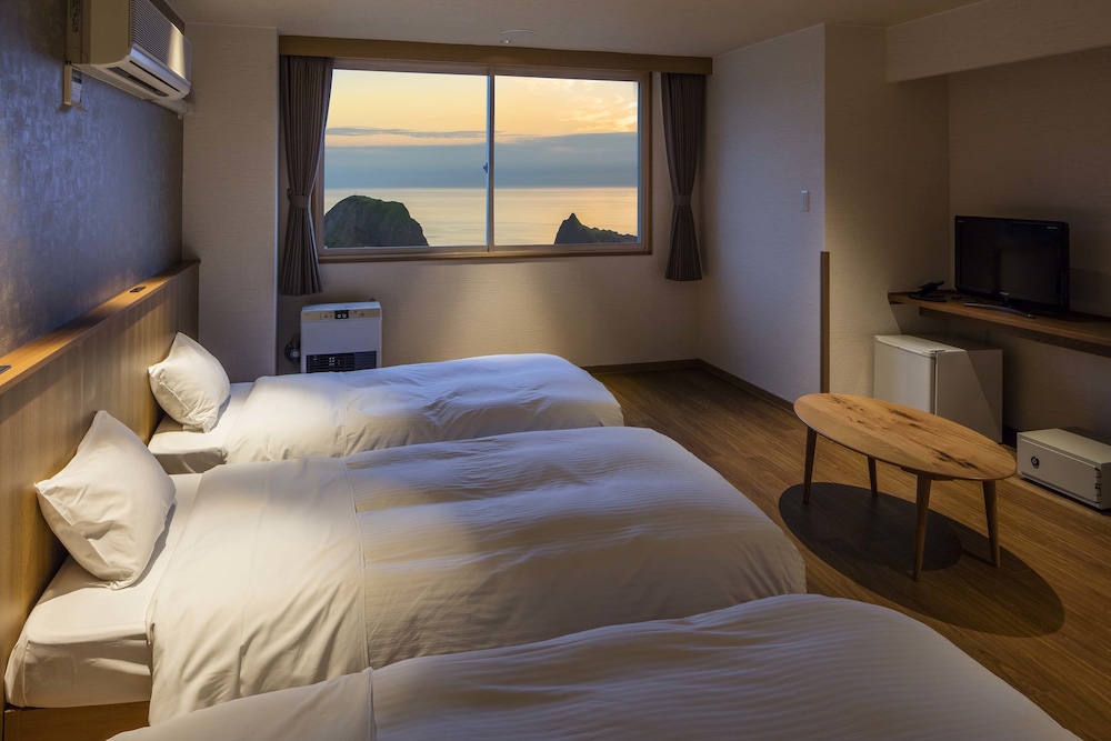 知床夕陽のあたる家 ONSEN HOSTEL 女満別